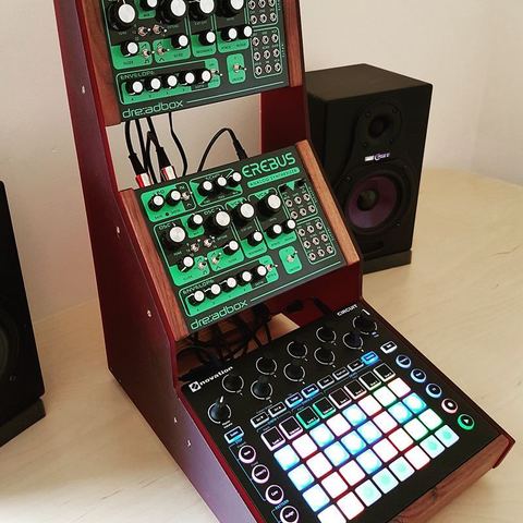 Andy Pidcock's custom Cirebus desk stand made by mixingtable for 2x Erebus & Novation Circuit