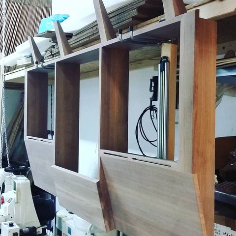 Main rack bays of a 33U solid walnut producer desk ready for oil finishing